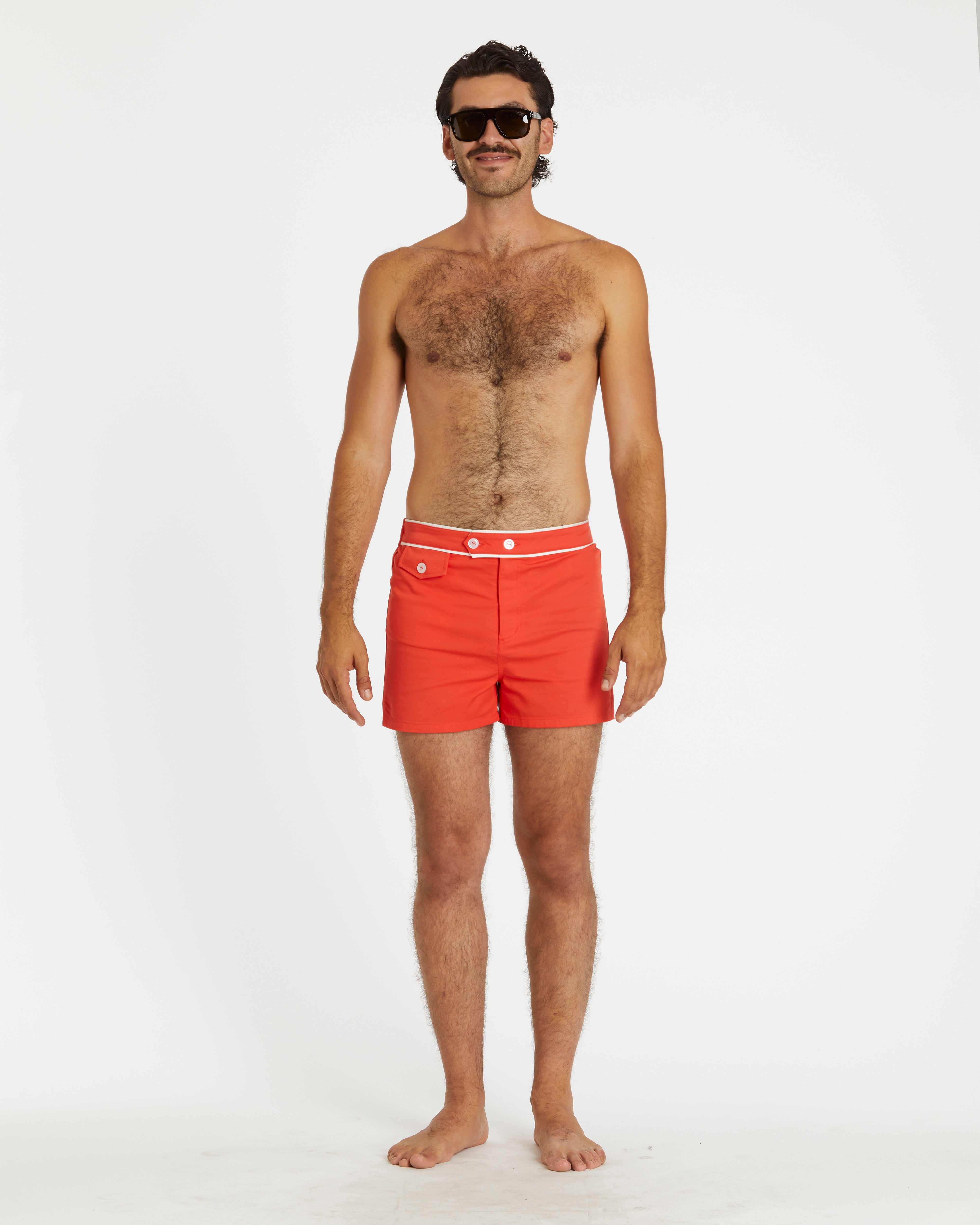 man wearing red trunks