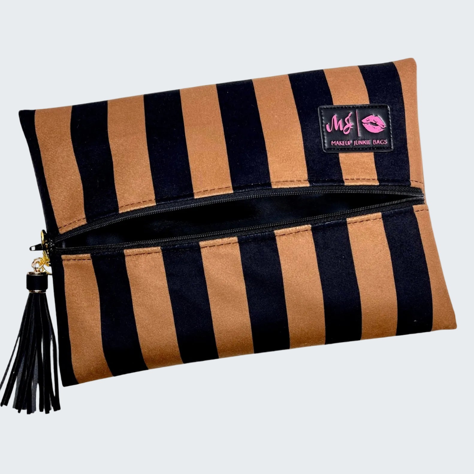 Striped clutch bag with tassel on a white background