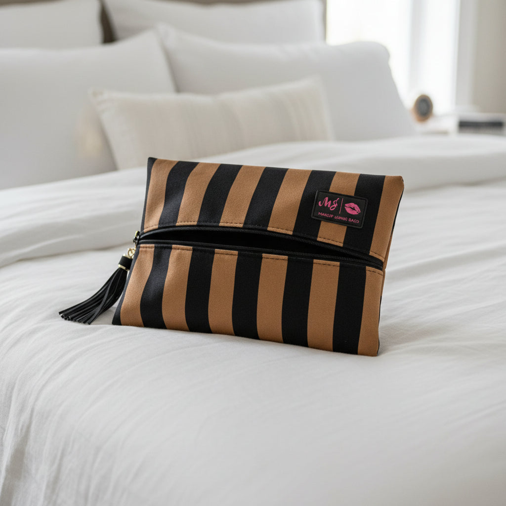 Striped clutch bag with tassel on a white background