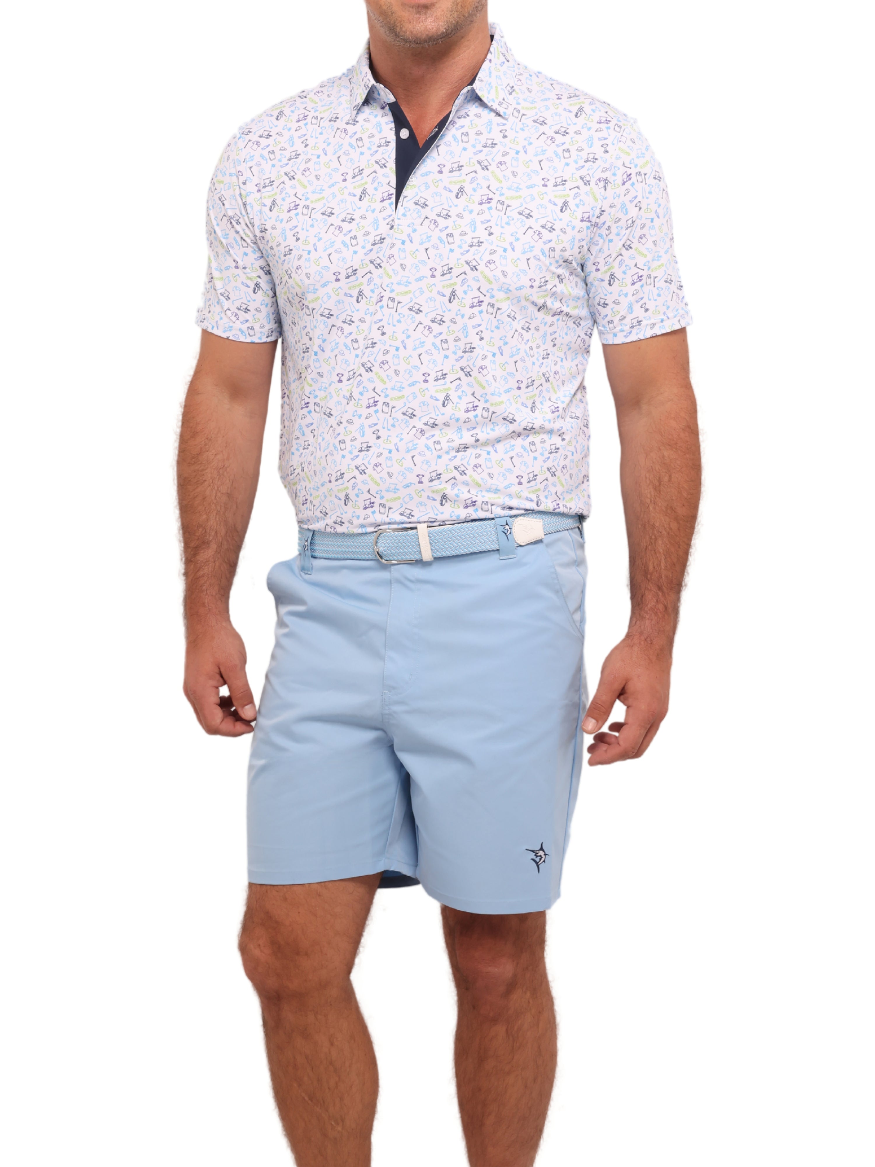 Man wearing a patterned white shirt and light blue shorts on a white background