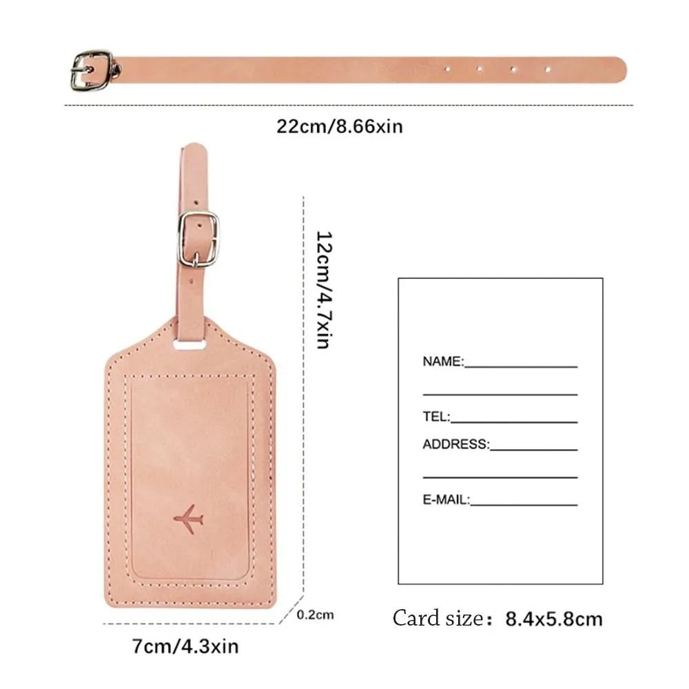 Pink leather luggage tag with dimensions and label space on a white background