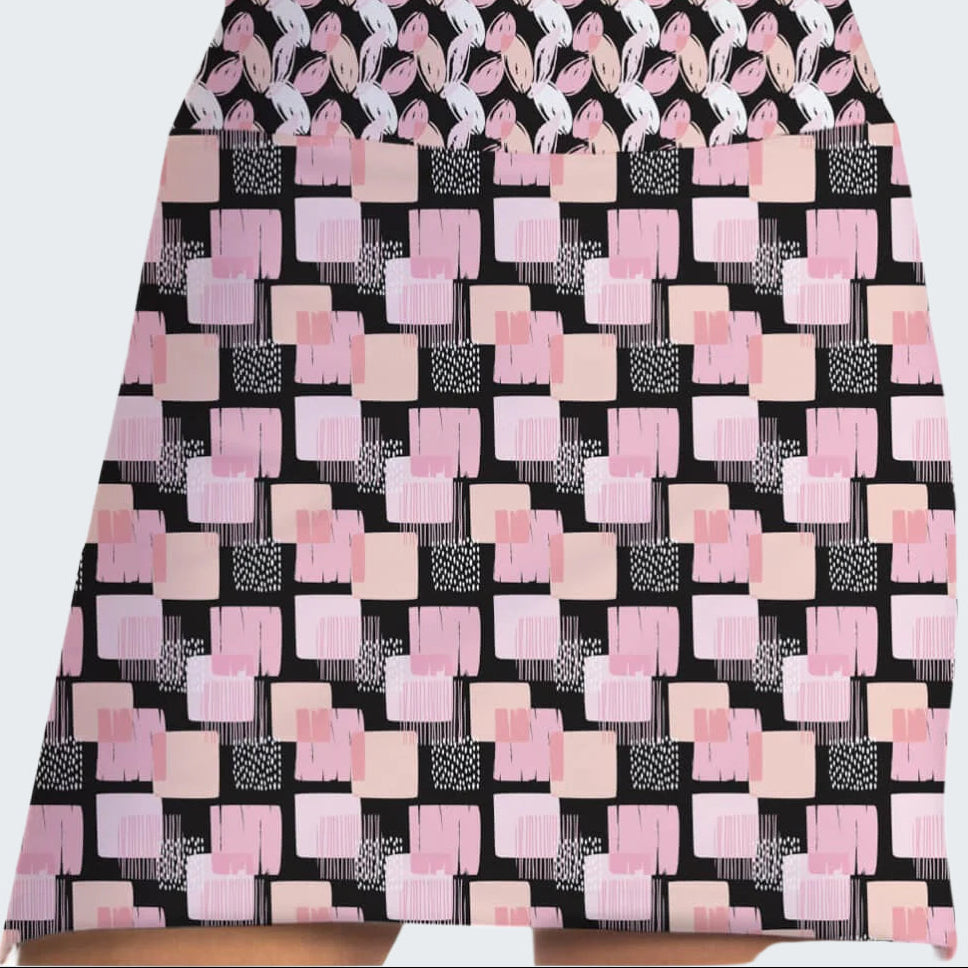 Skirt with pink and white geometric pattern on black background