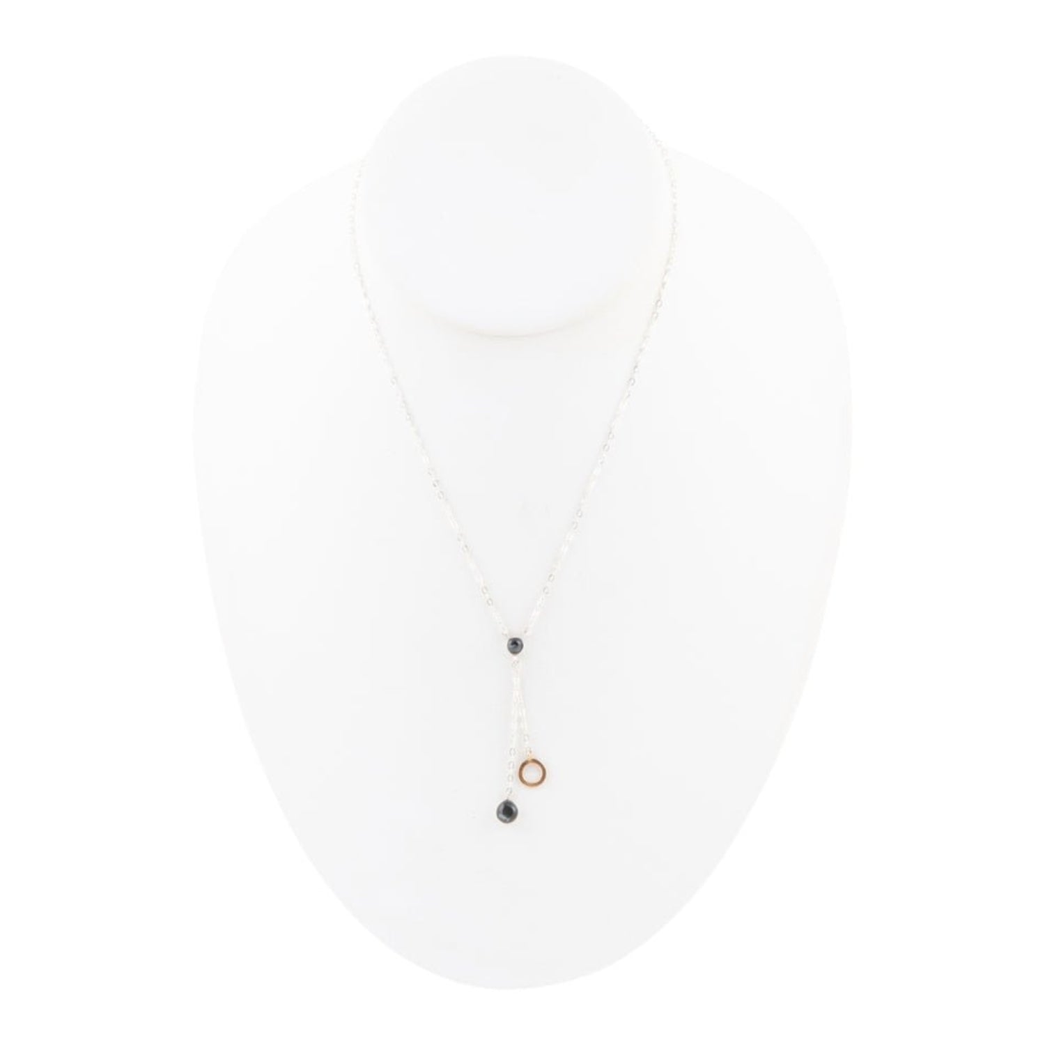 Necklace with small round pendants on a white background
