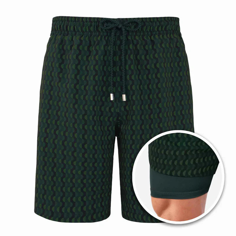 Green patterned shorts with a close-up inset on a white background