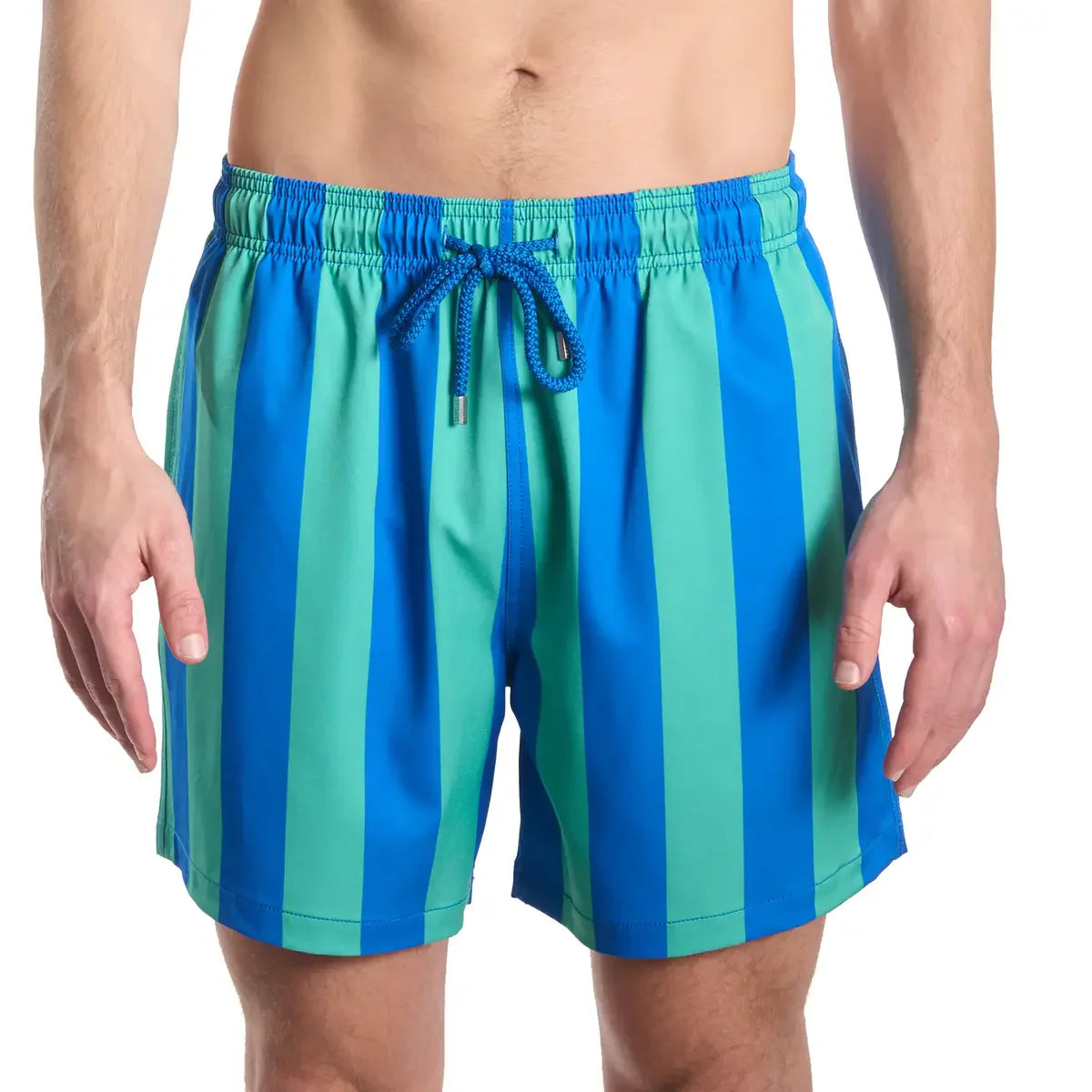 Blue and green striped swim shorts on a white background