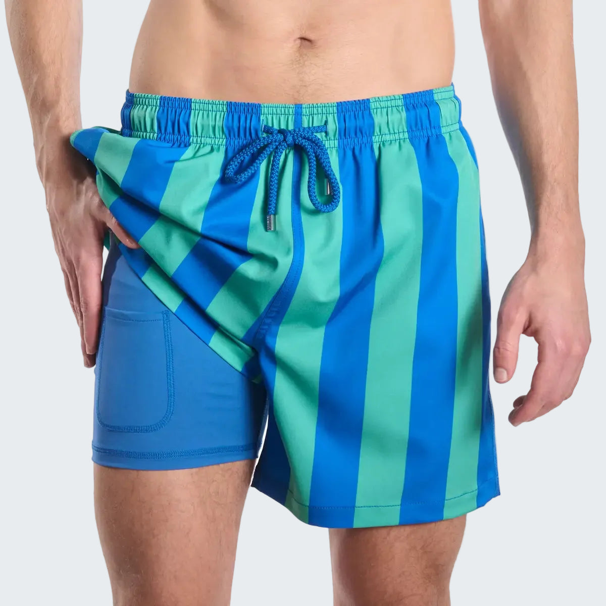 Blue and green striped swim shorts on a white background