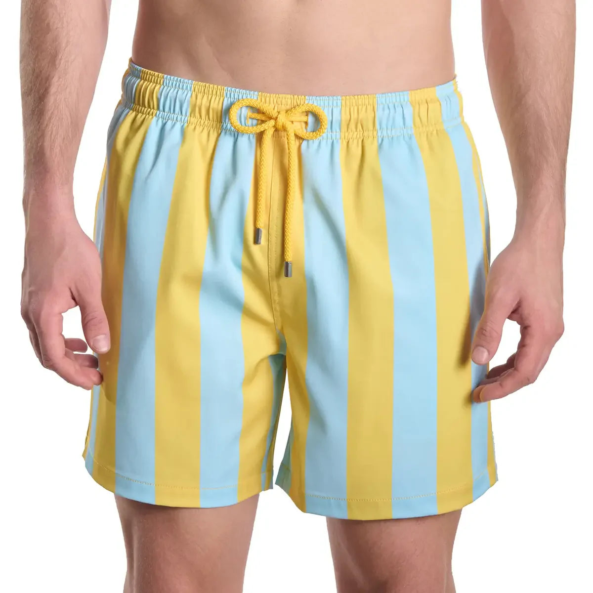 Yellow and light blue striped swim shorts on a white background
