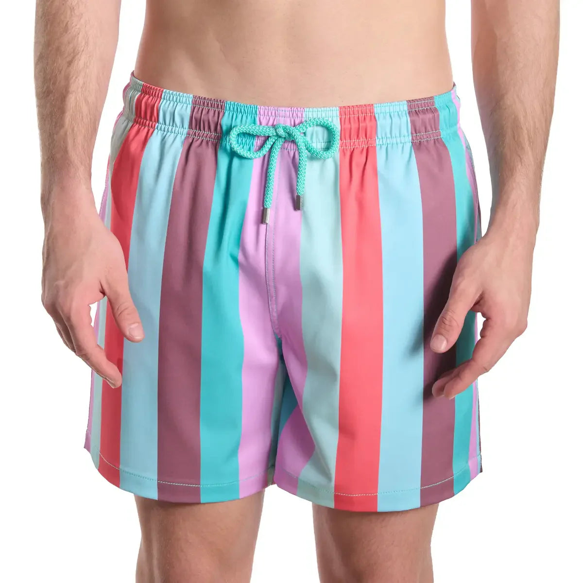 Multicolored striped swim shorts with a drawstring on a white background