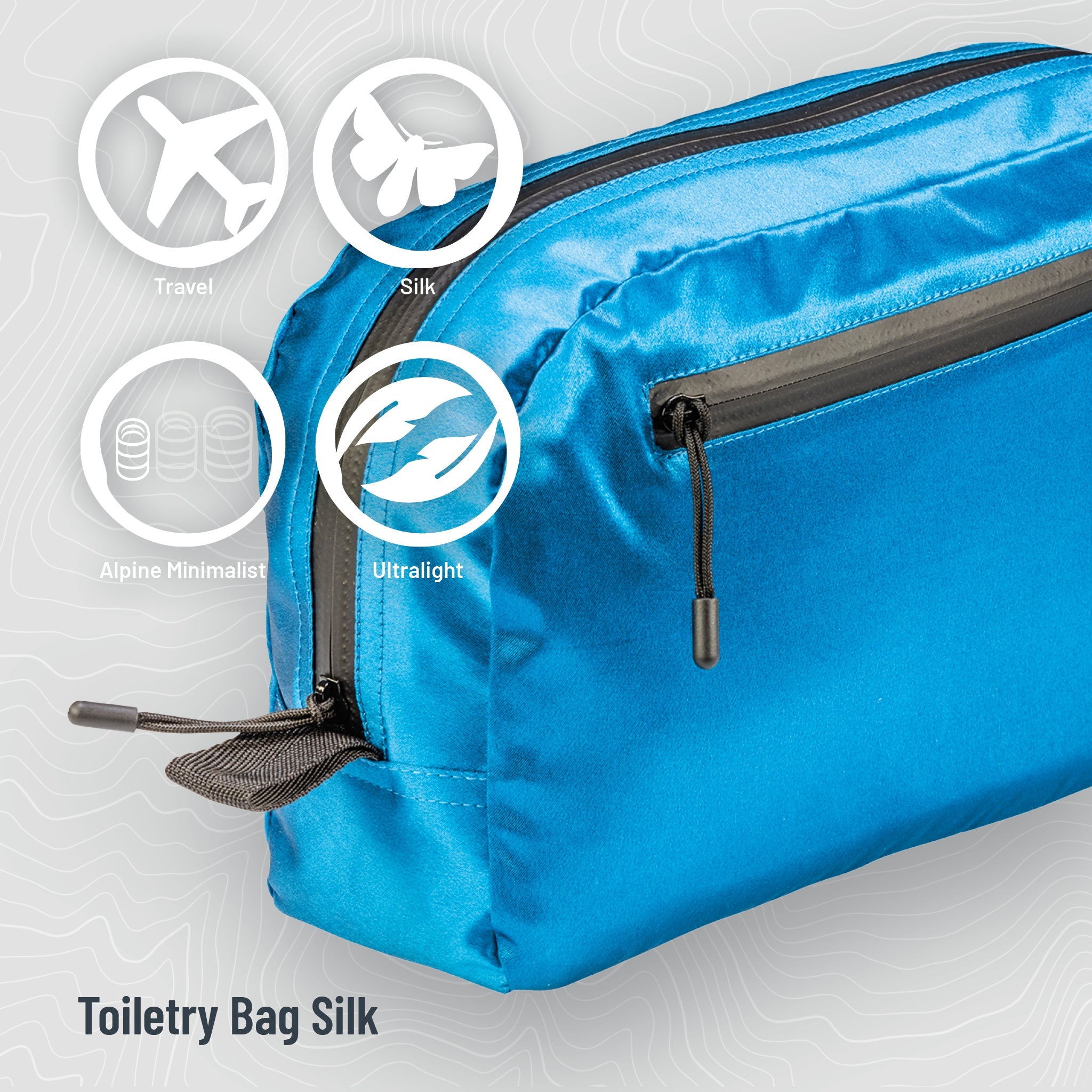 Blue toiletry bag with features highlighted on a light gray background