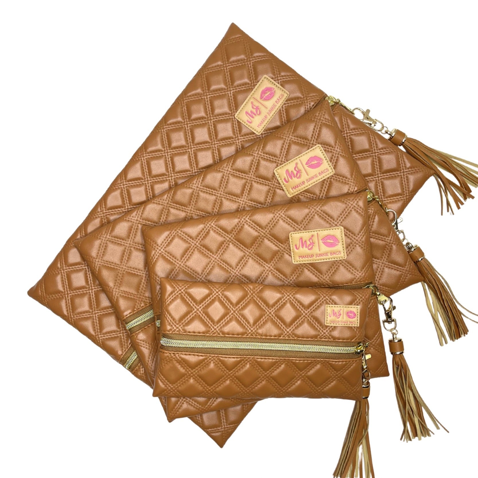 Set of brown quilted handbags with tassels on a white background