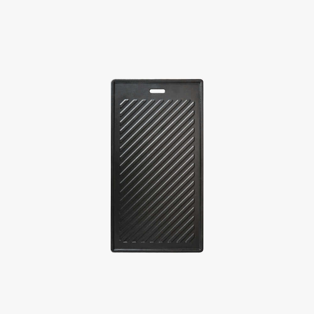 Black rectangular griddle pan on a white background