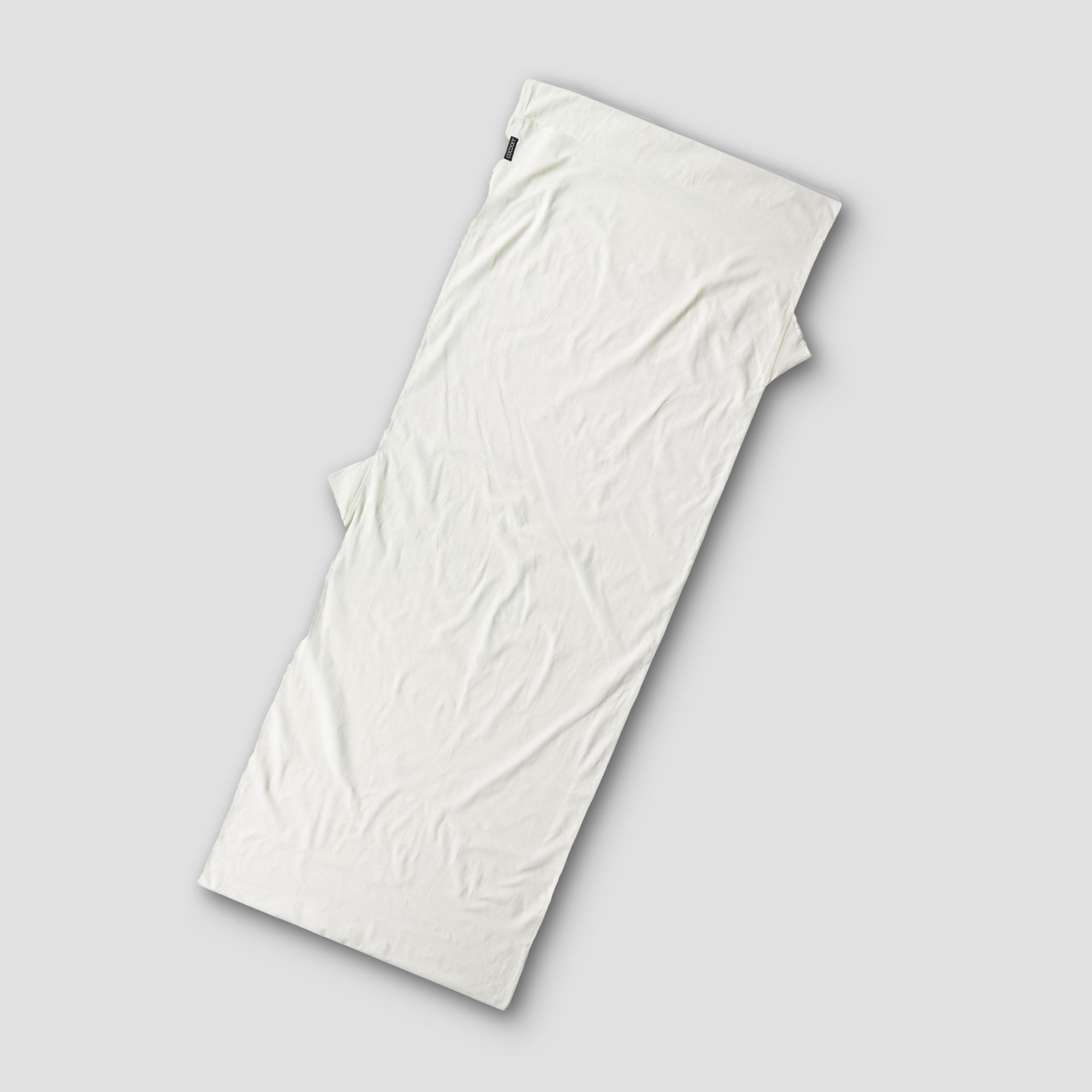 White t-shirt on a light gray background