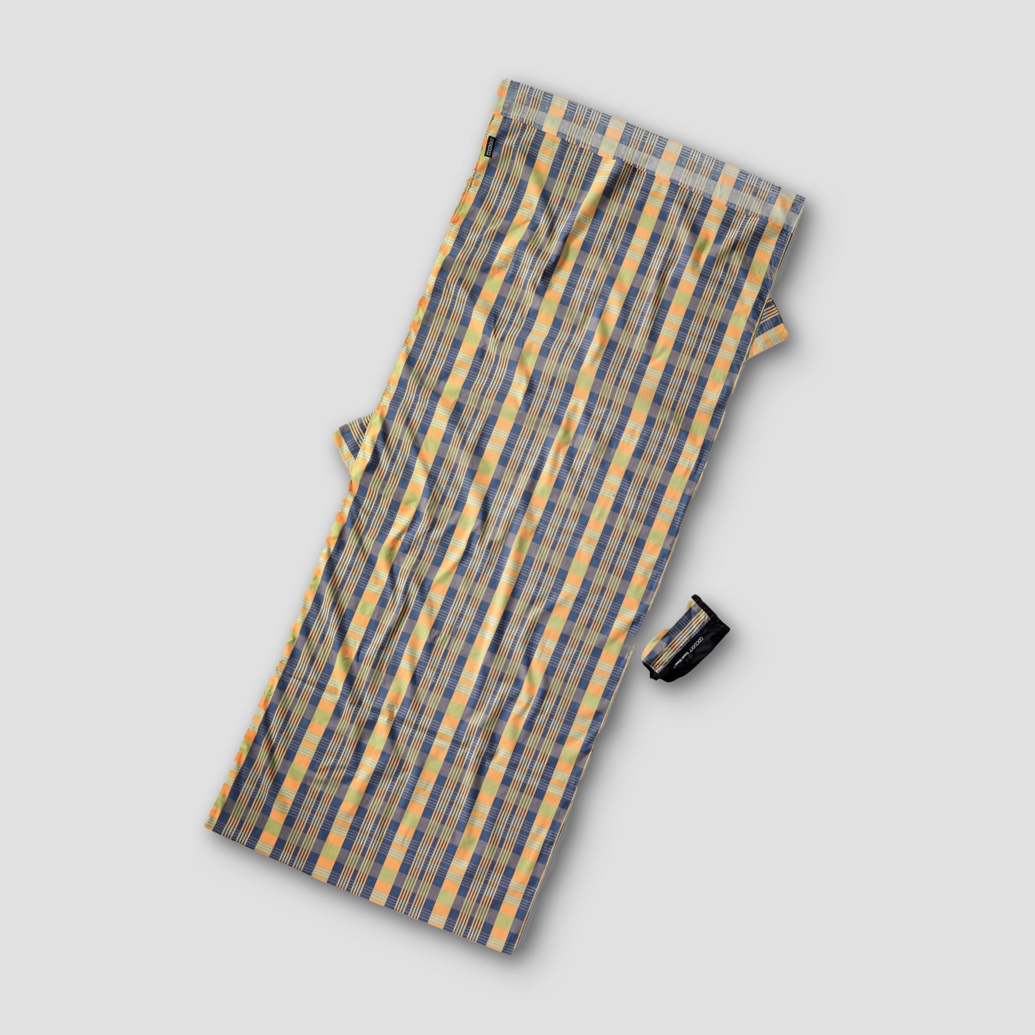 Plaid-patterned product on a light gray background