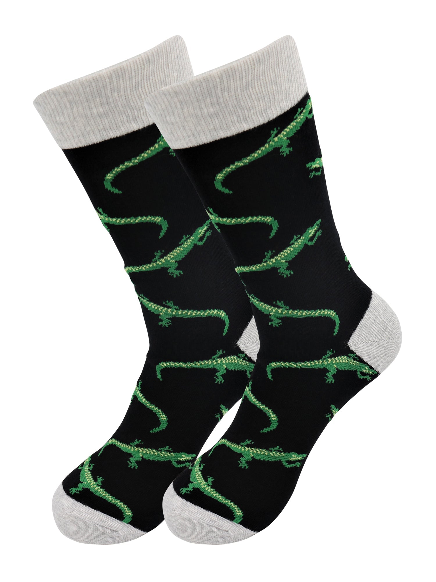 Two socks with green lizard pattern on black background