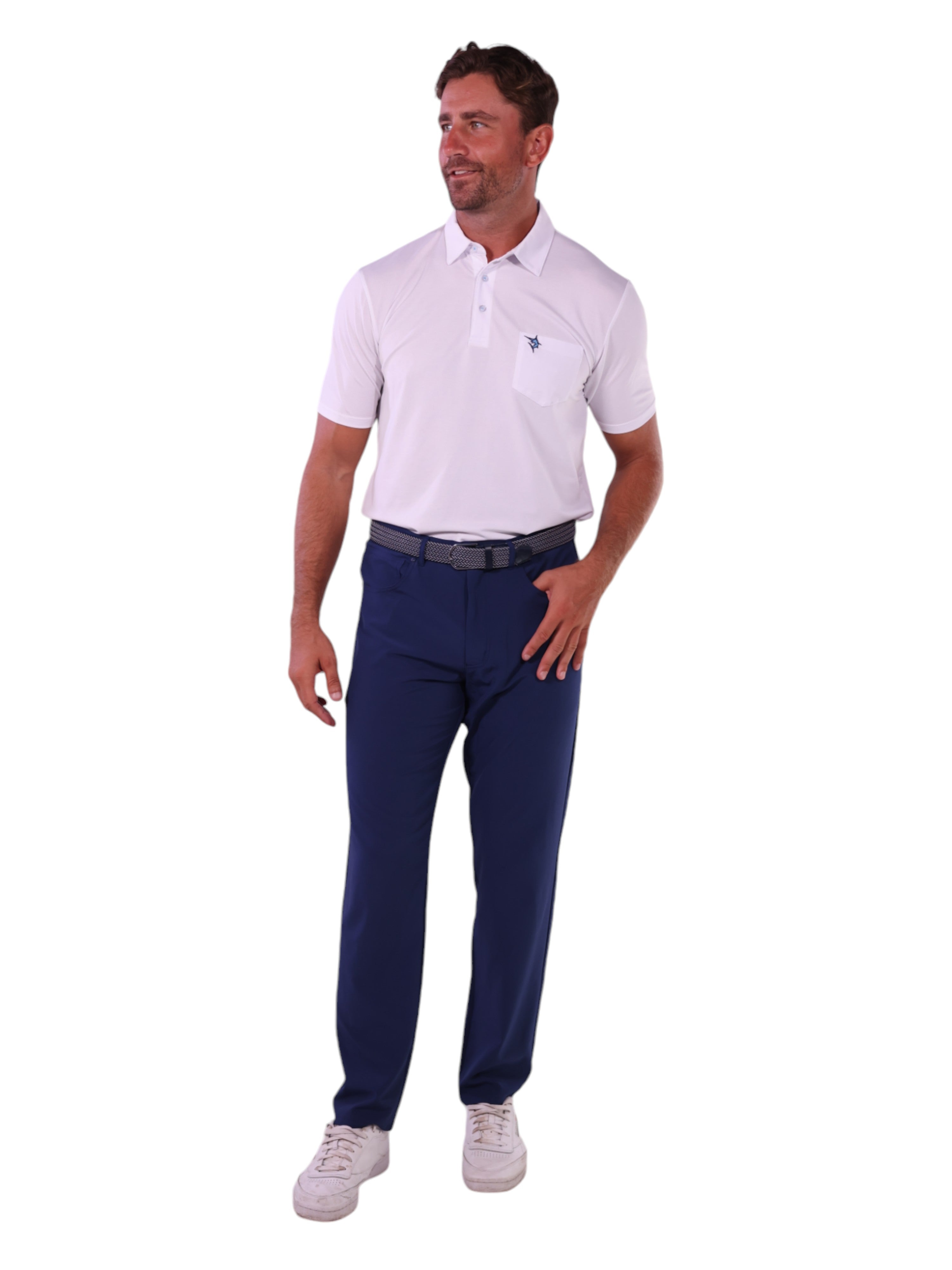 Man wearing a white polo shirt and navy pants on a white background