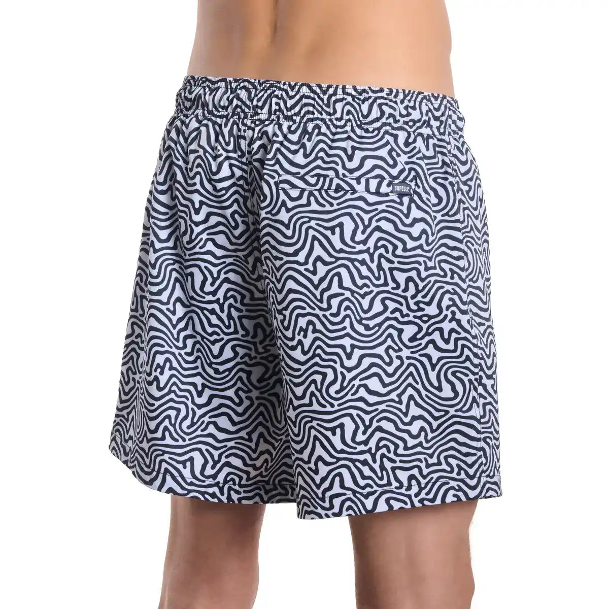 Navy and white patterned shorts on a white background