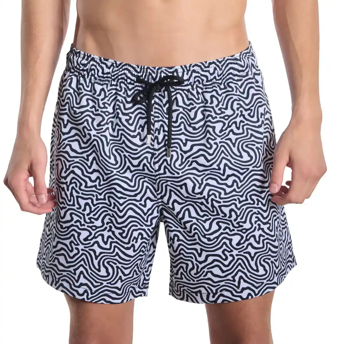 Black and white patterned swim shorts on a white background