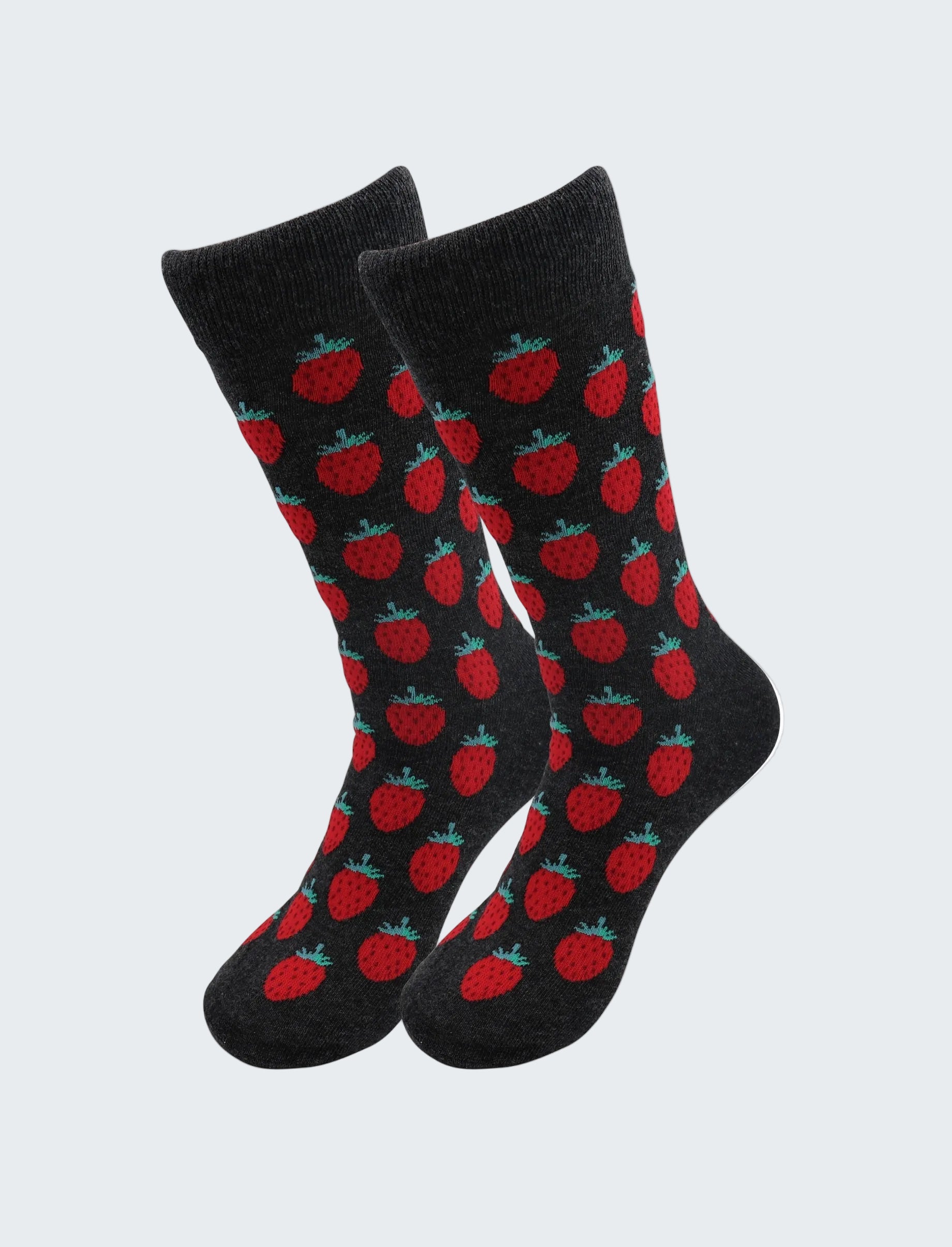 Black socks with red strawberry pattern on a white background