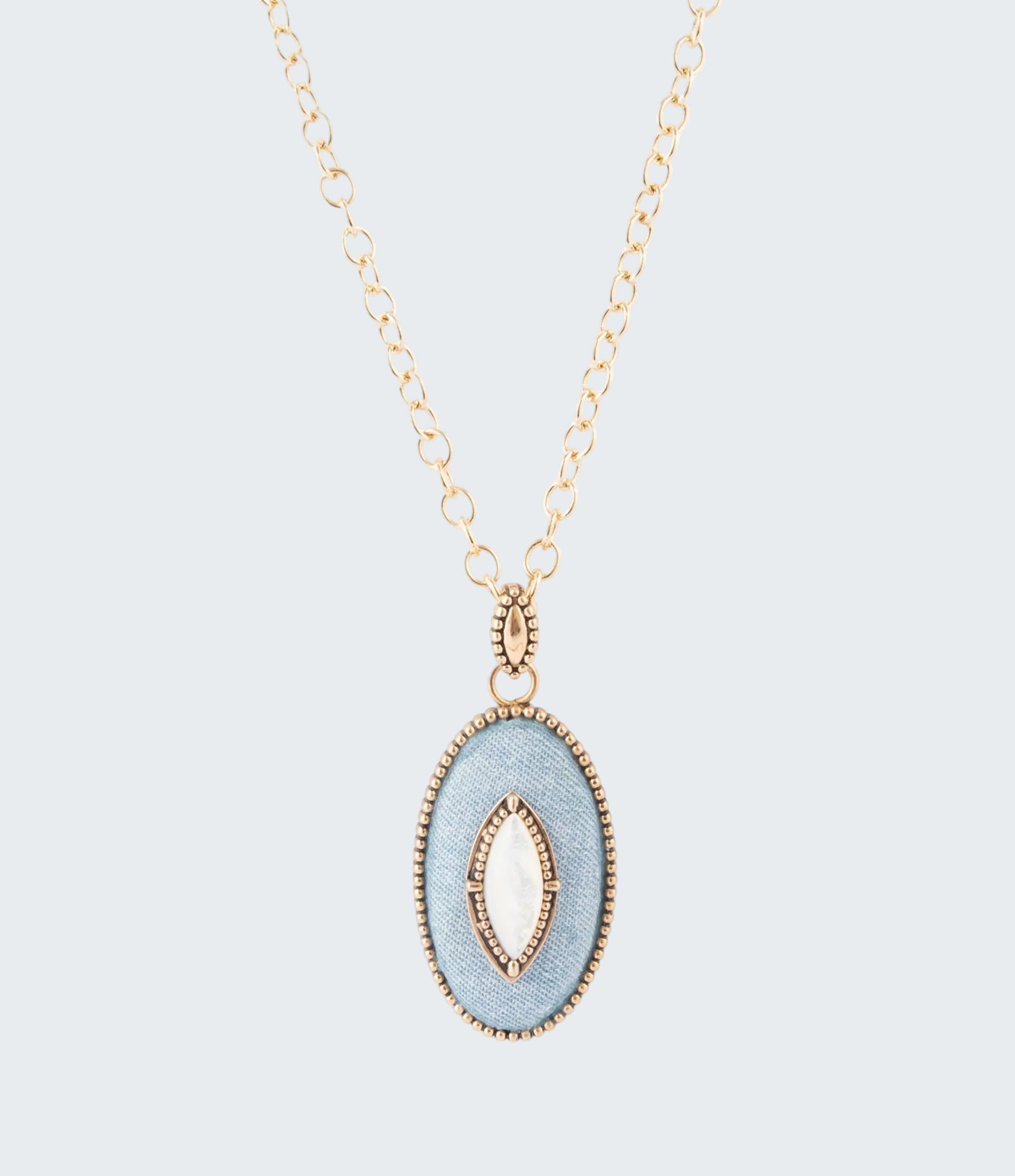 Necklace with a light blue pendant on a white background
