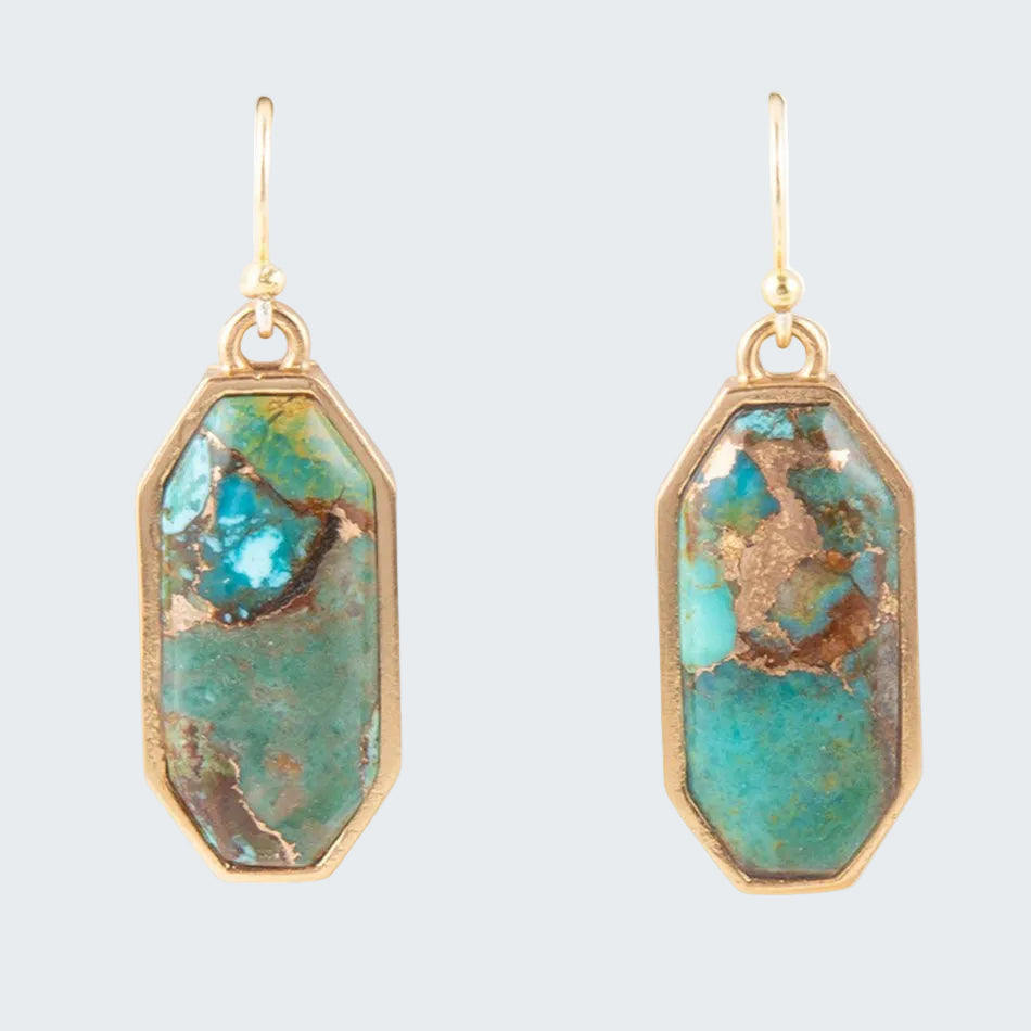 Turquoise stone earrings with gold frames on a white background