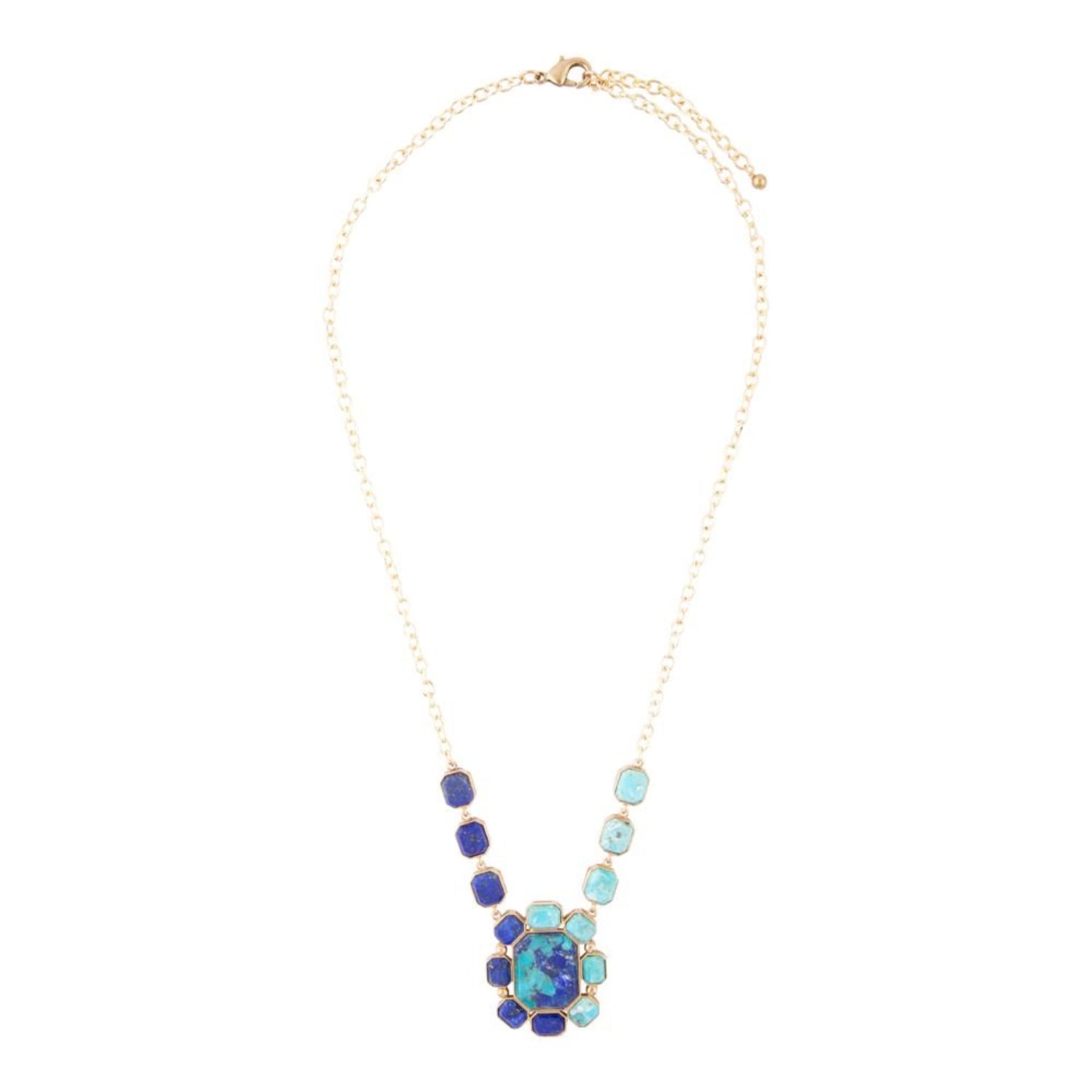 Necklace with blue and green bead cluster on a white background