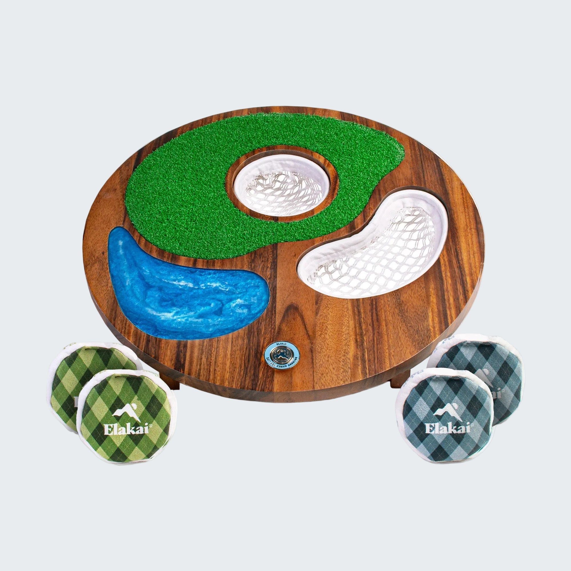 Golf-themed mini putting green with three Elakai golf balls on a white background