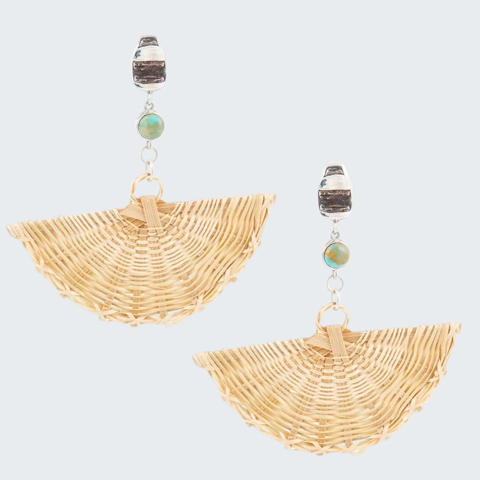 Pair of raffia fan-shaped earrings with beaded accents on a white background