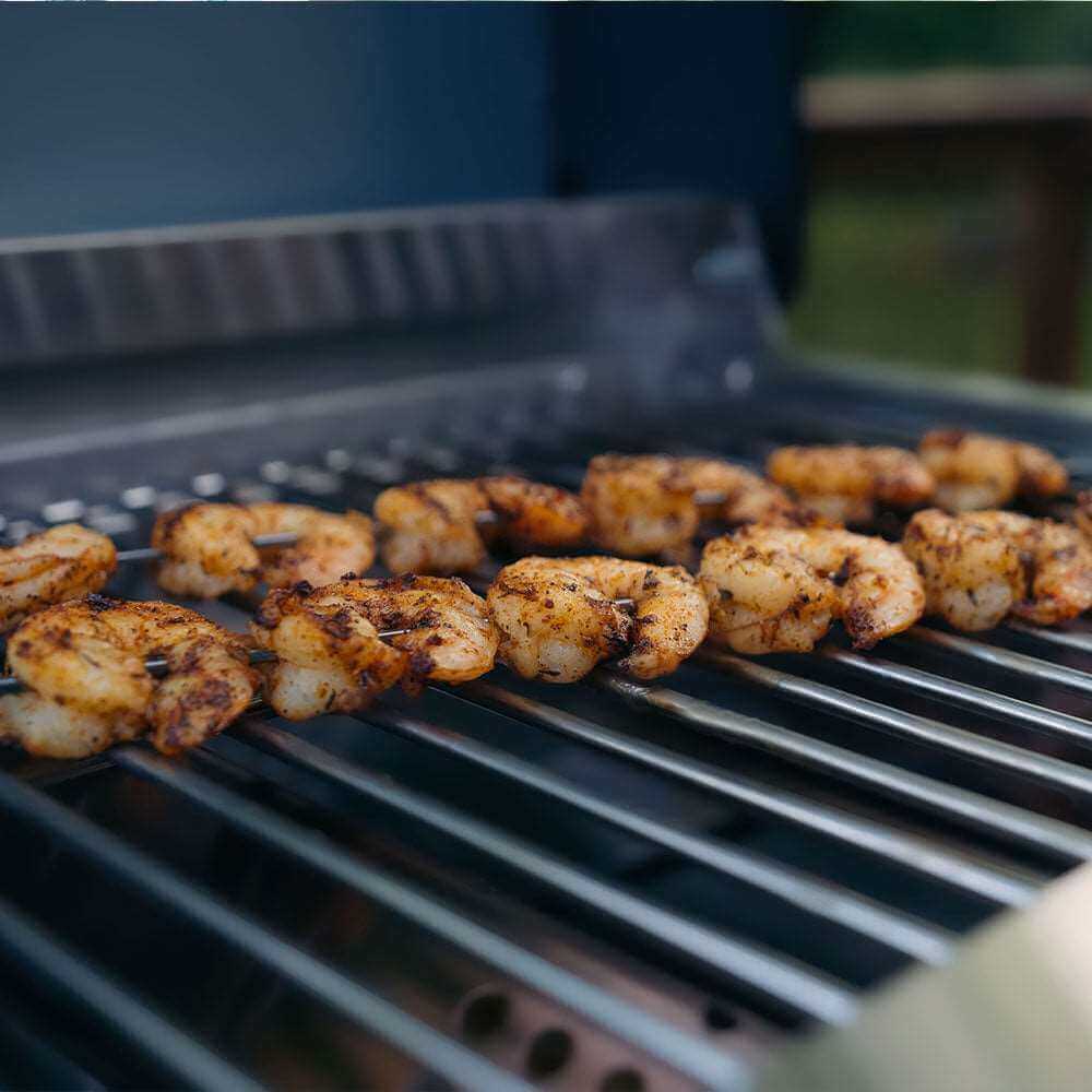 Shrimp being grilled on a barbecue grill