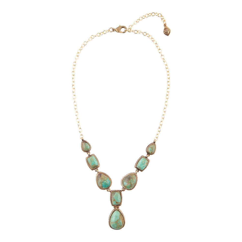 Necklace with turquoise stones on a white background
