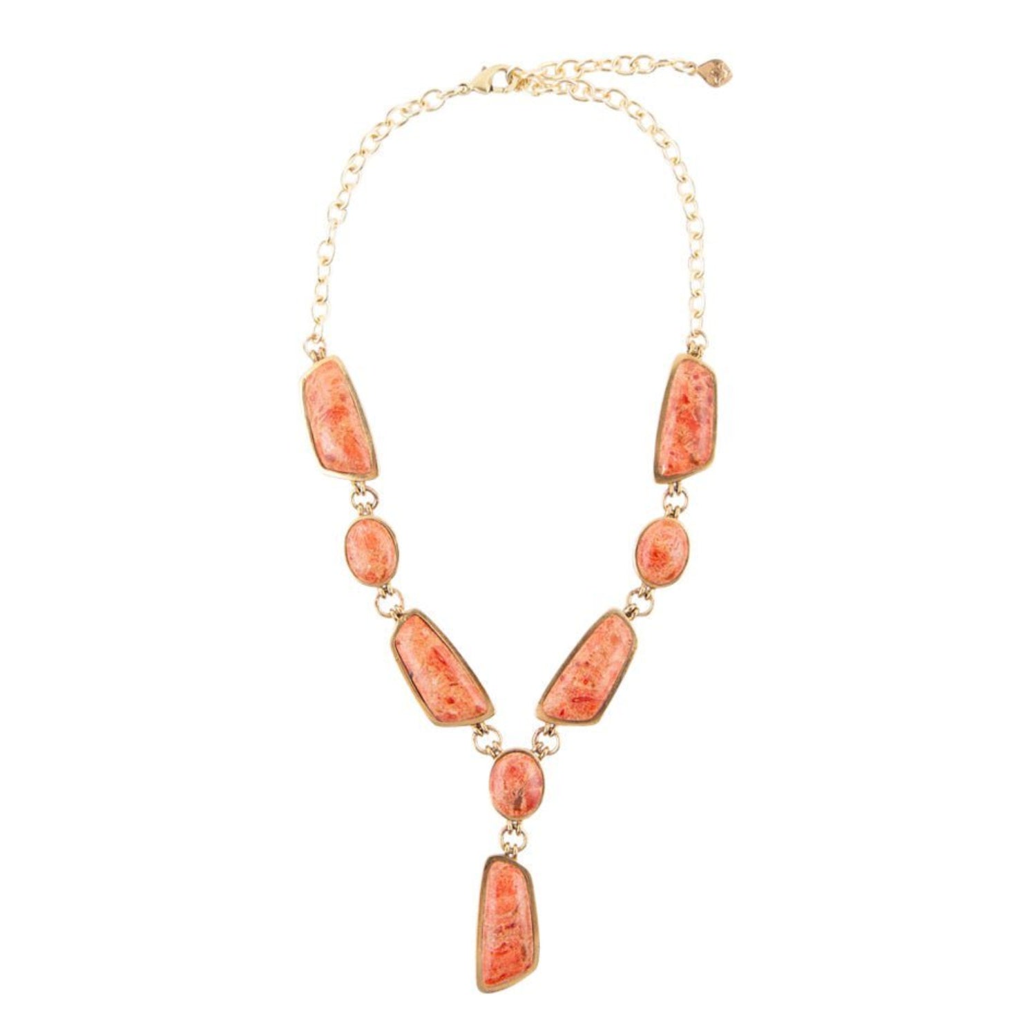 Necklace with coral-colored beads on a white background
