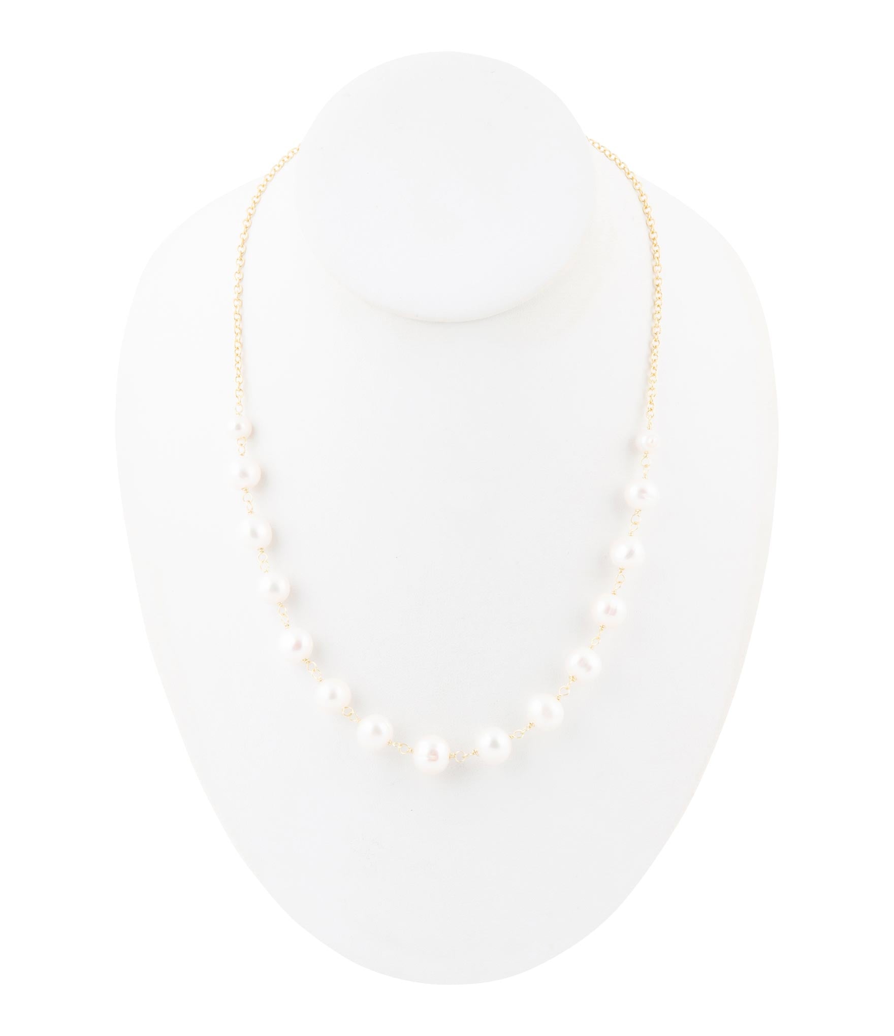 Pearl necklace on a white background
