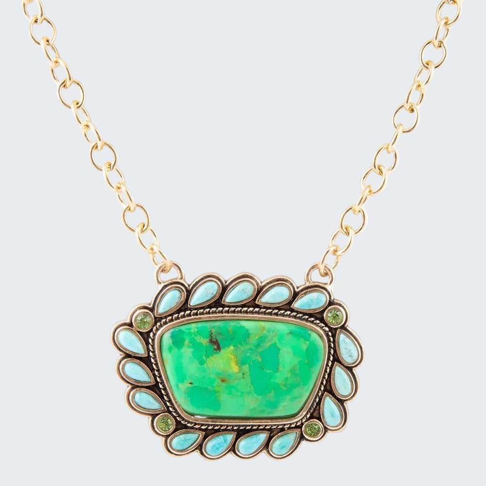 Necklace with a green stone pendant on a white background