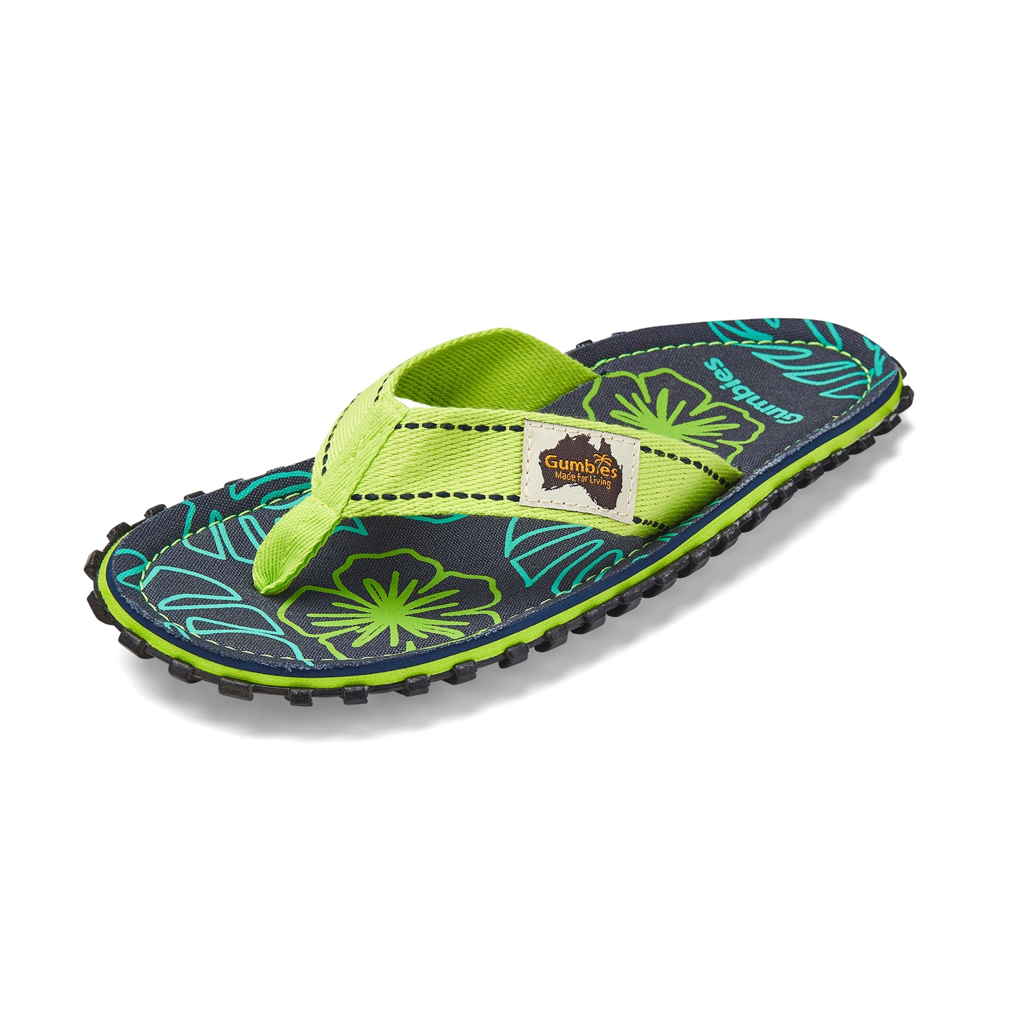 Green and black sandal with floral pattern on a white background