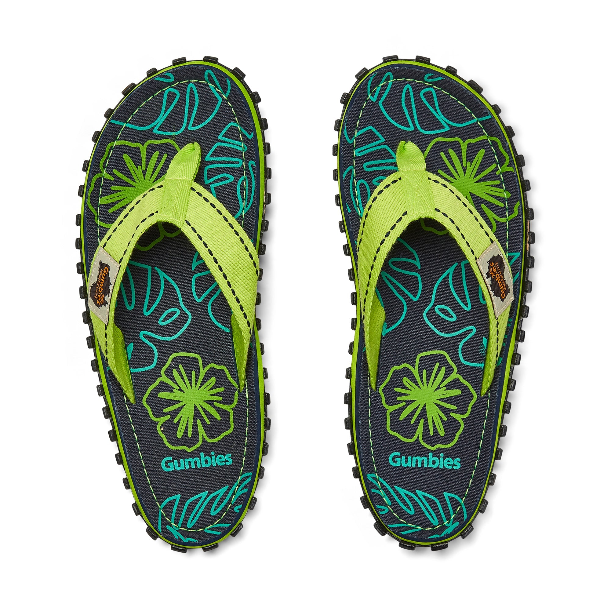 Pair of Gumbies flip-flops with floral design on a white background