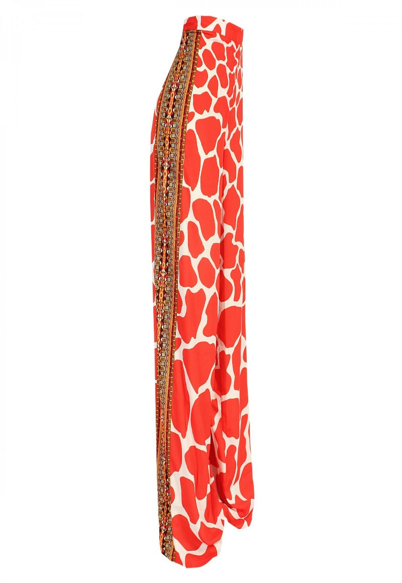 Red and white patterned skirt with decorative trim on a white background