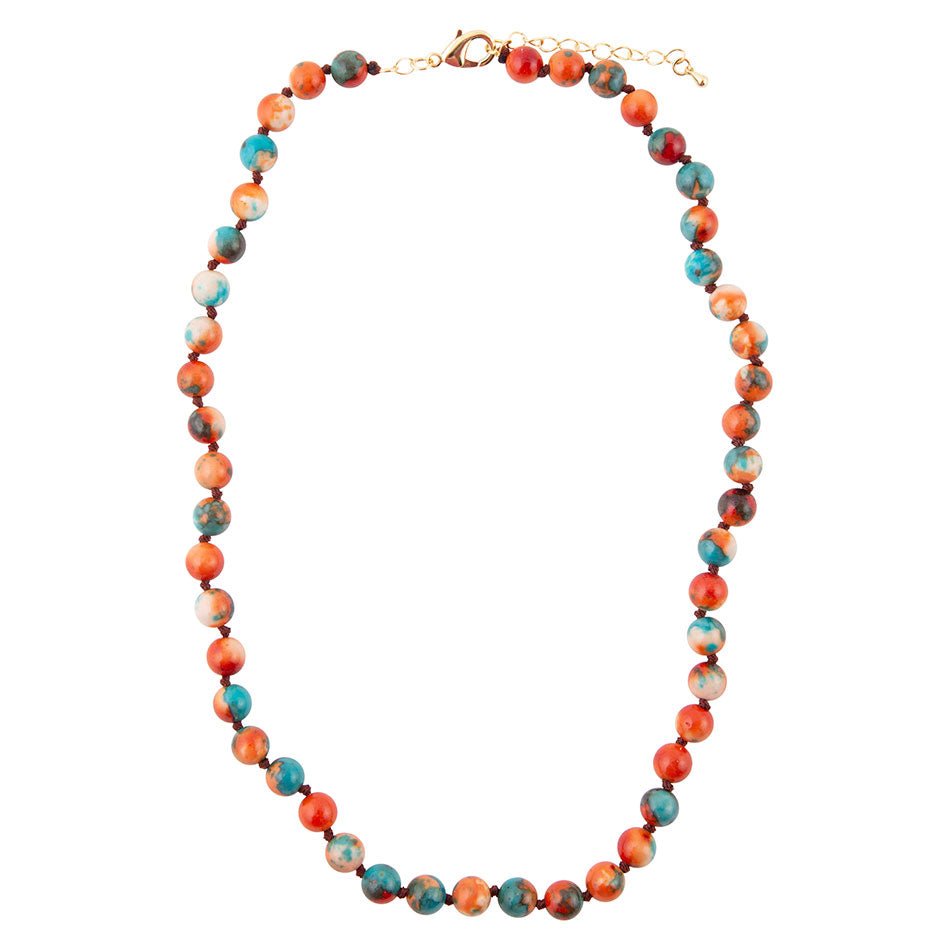 Necklace with multicolored beads on a white background