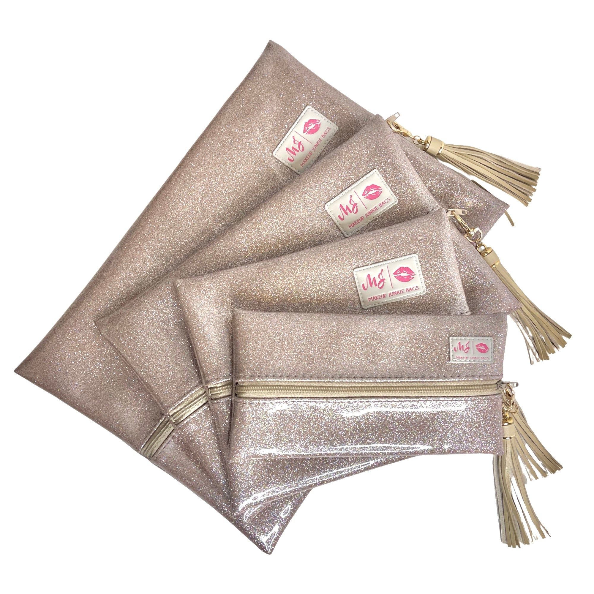 Set of glittery pouches with tassels and visible branding on a white background
