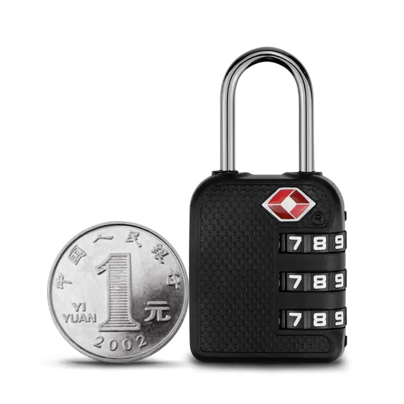 Black combination lock with a coin for size comparison on a white background