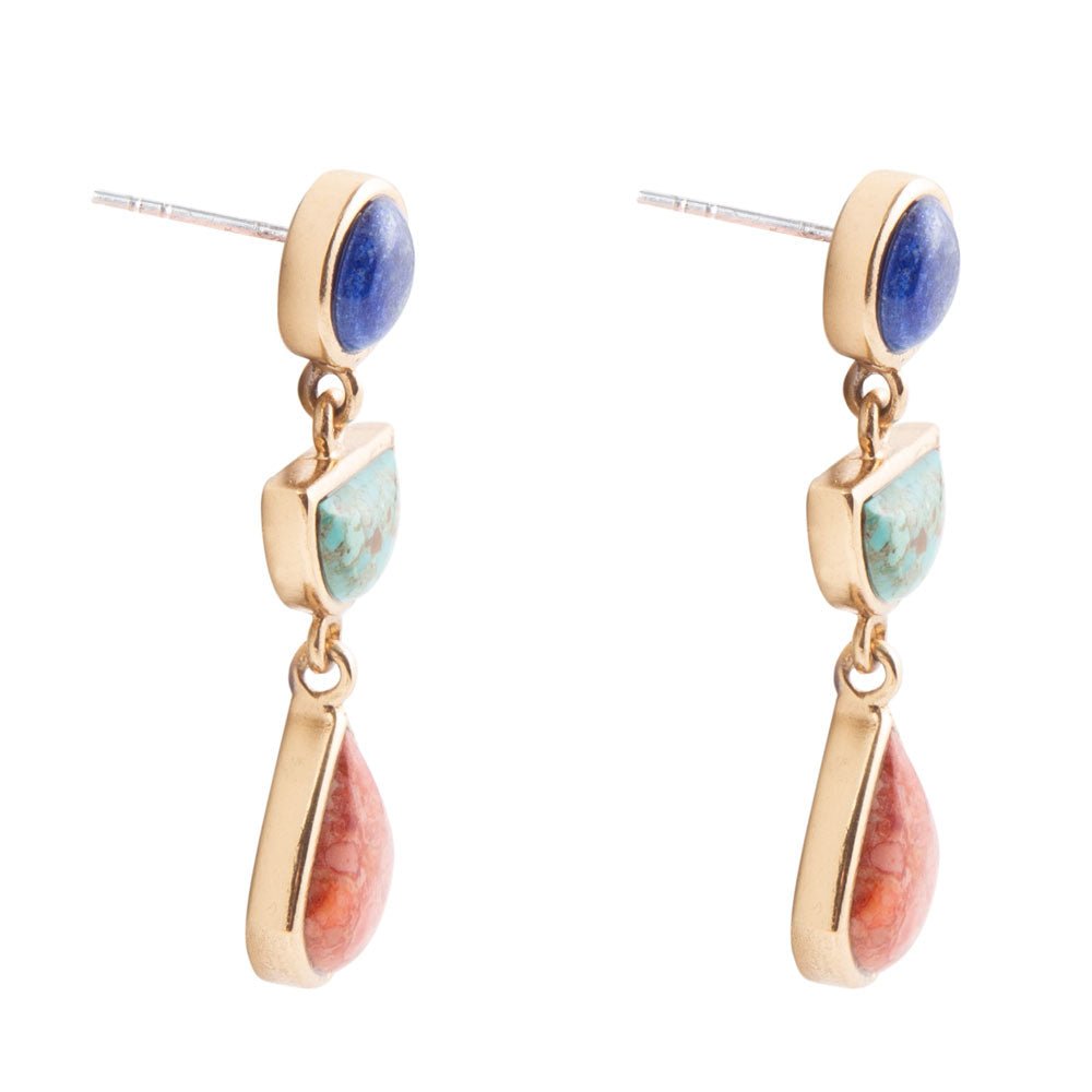 Pair of earrings with gold frames, blue, pink, and turquoise stones on a white background