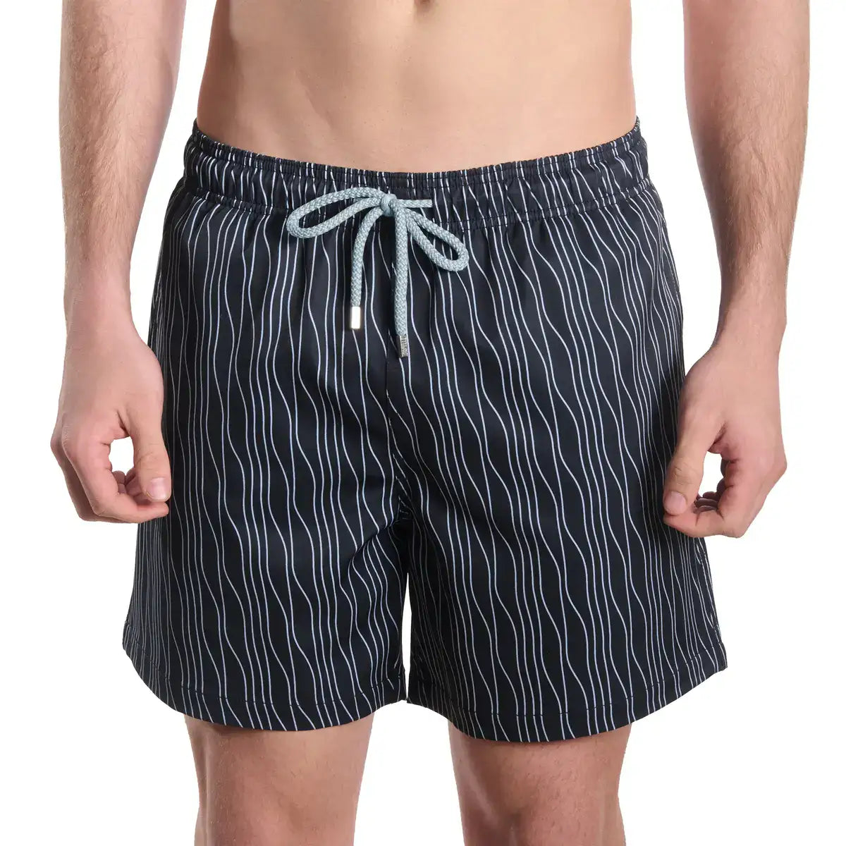 Black swim shorts with white stripes on a white background