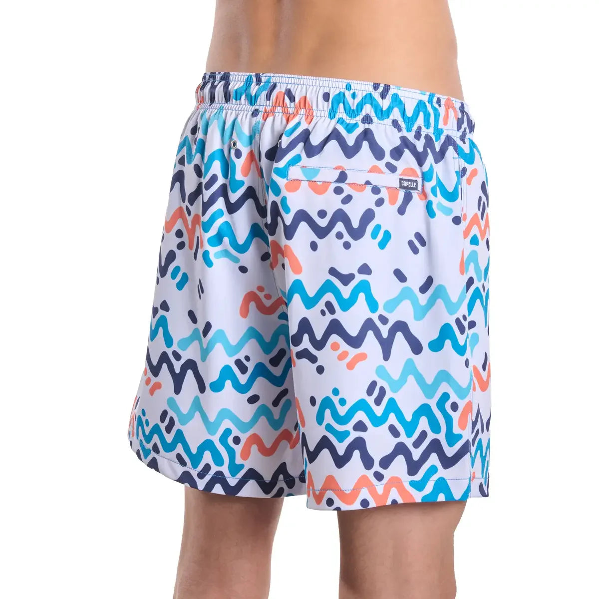 Colorful wavy patterned shorts on a white background
