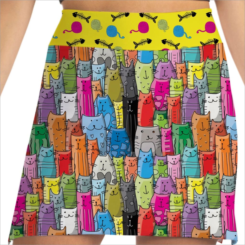 Colorful skirt with pattern of cartoon cats on a white background