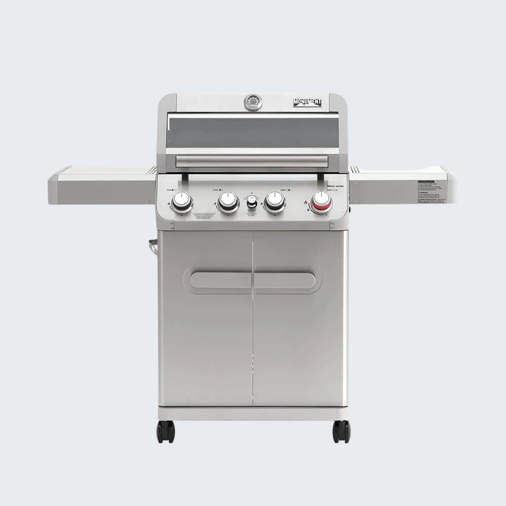 Stainless steel grill with control knobs on a white background