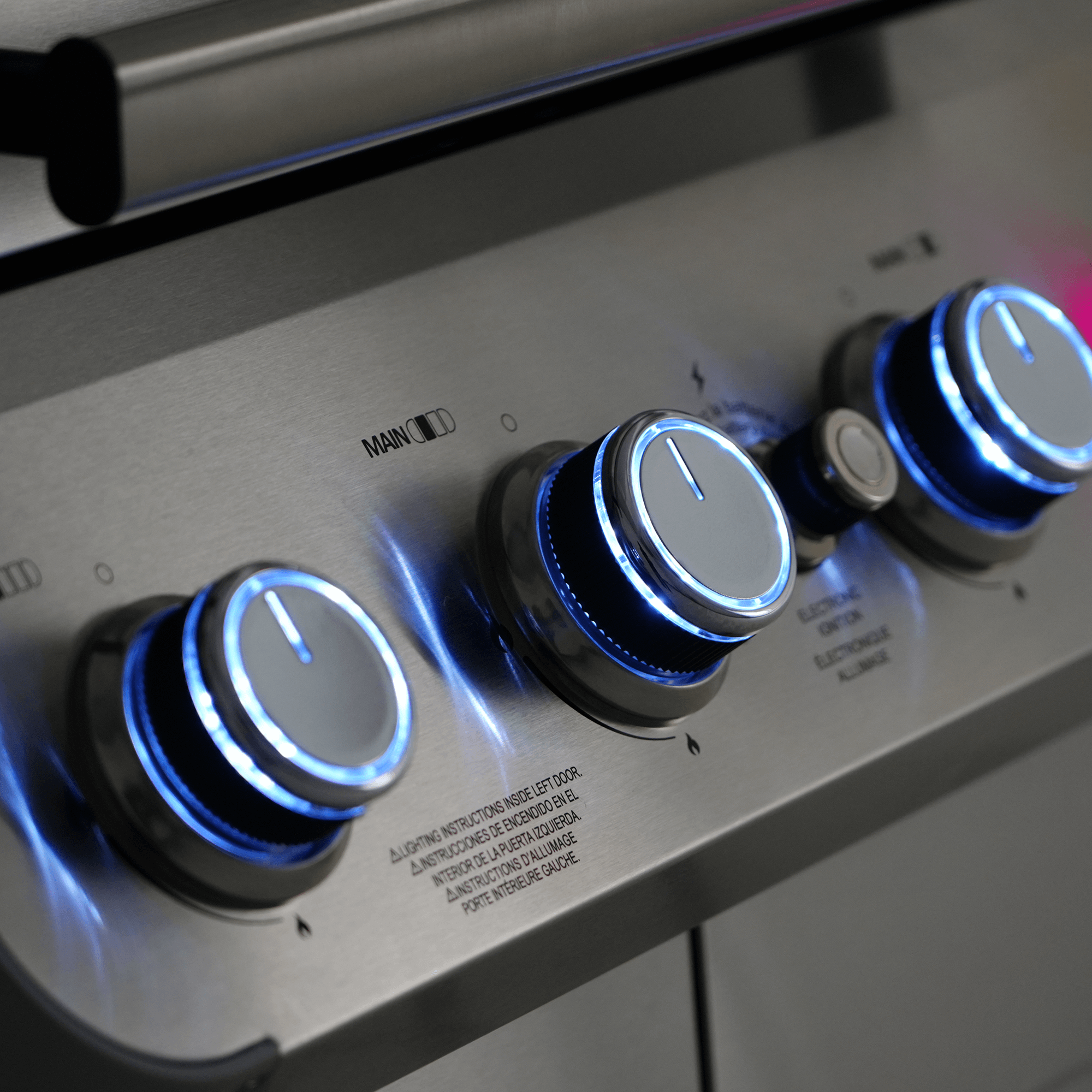 Control panel of a stove with knobs and labels