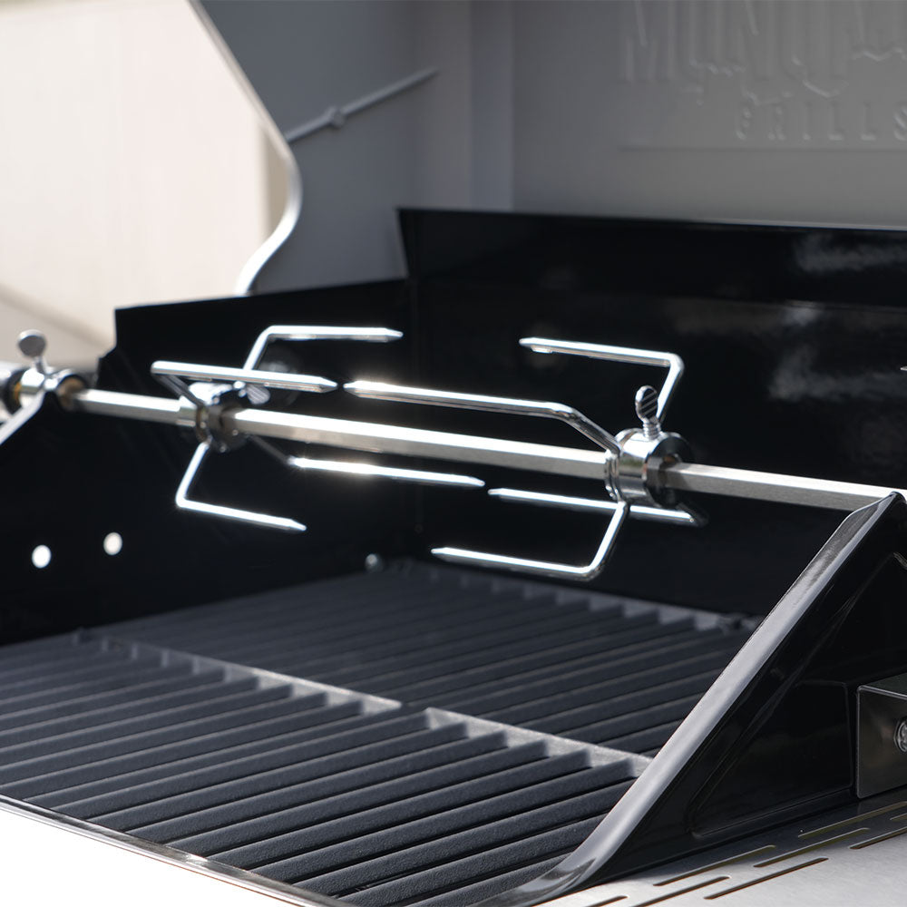 Close-up of a grill with a rotisserie system, featuring the Minuteman Grills brand.