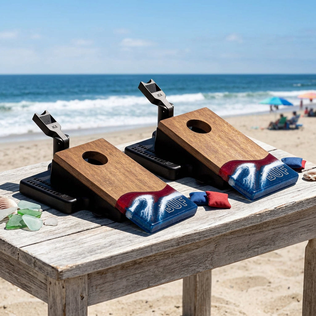 Two wooden cornhole boards with blue and red designs on a white background