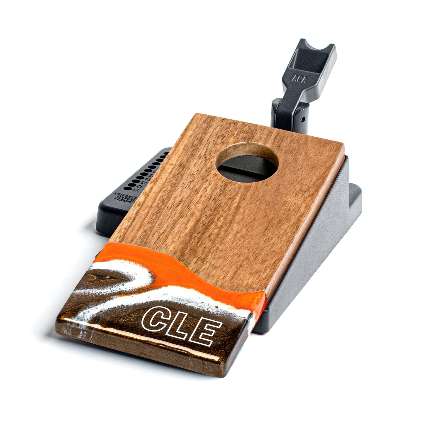 Wooden and metal device with 'CLE' branding on a white background