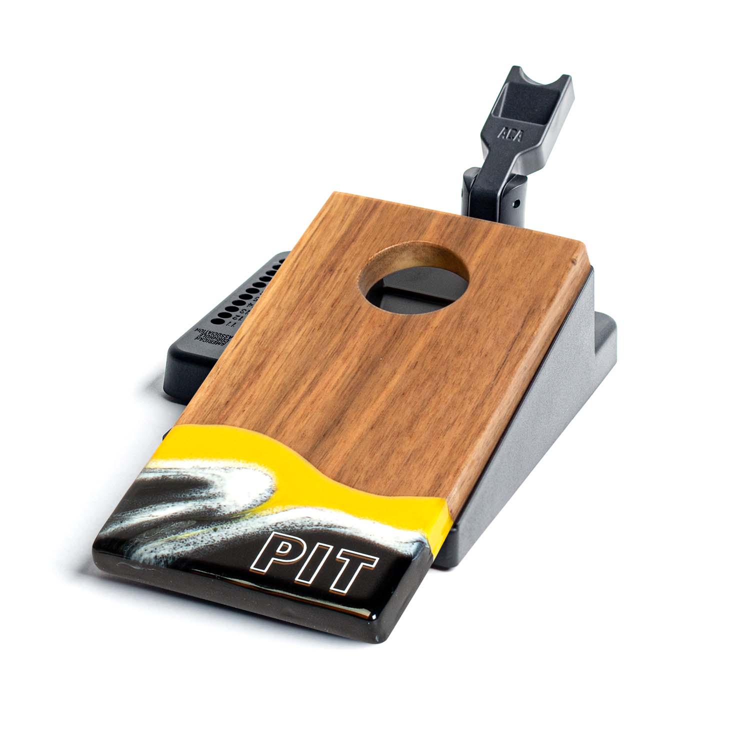 Wooden grill tool with a yellow accent and 'PIT' branding on a white background