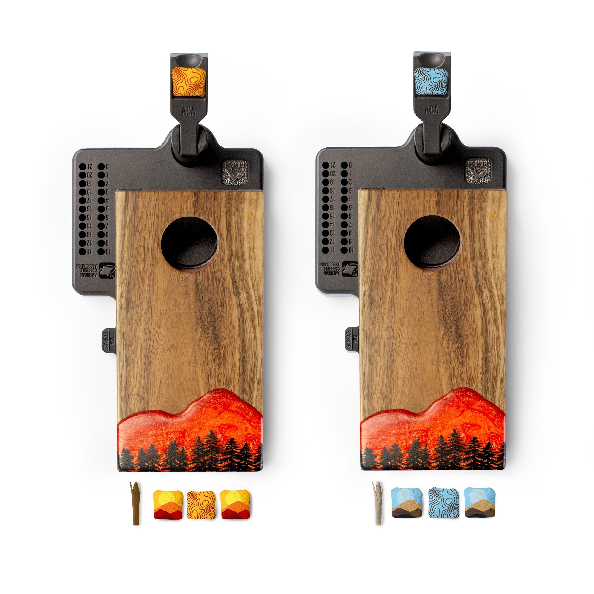 Two wooden cornhole boards with sunset design on a white background