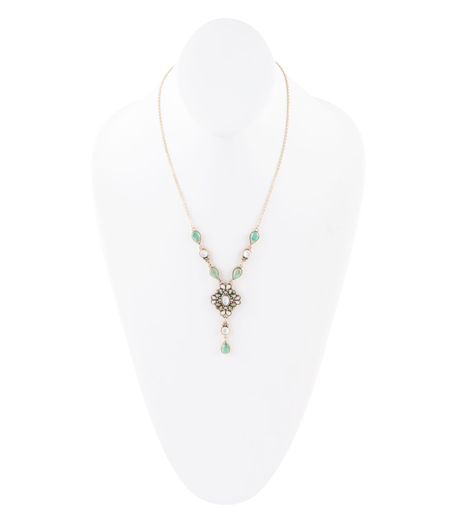 Necklace with green beads on a white background